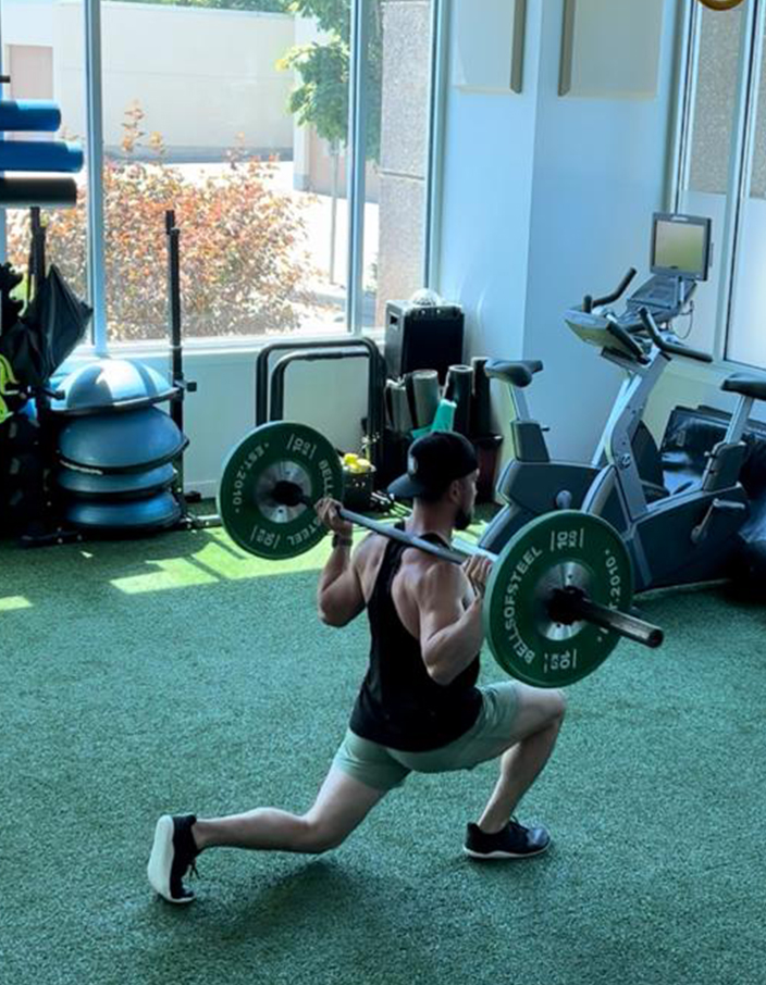 Athlete working through joint-specific mobility training